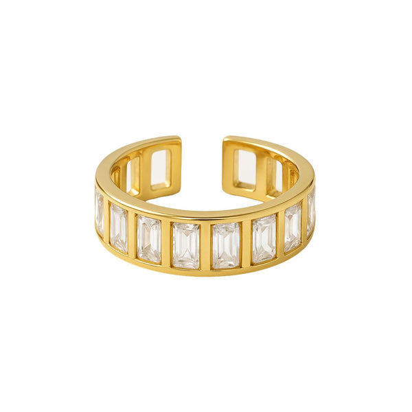 Goudkleurige stainless steel ring met ingelegde rechthoekige zirkonia steentjes en open achterkant.