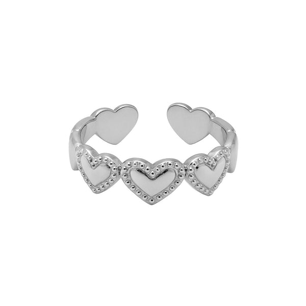 Zilverkleurige stainless steel ring met negen hartjes en bolletjesrand, verstelbaar design